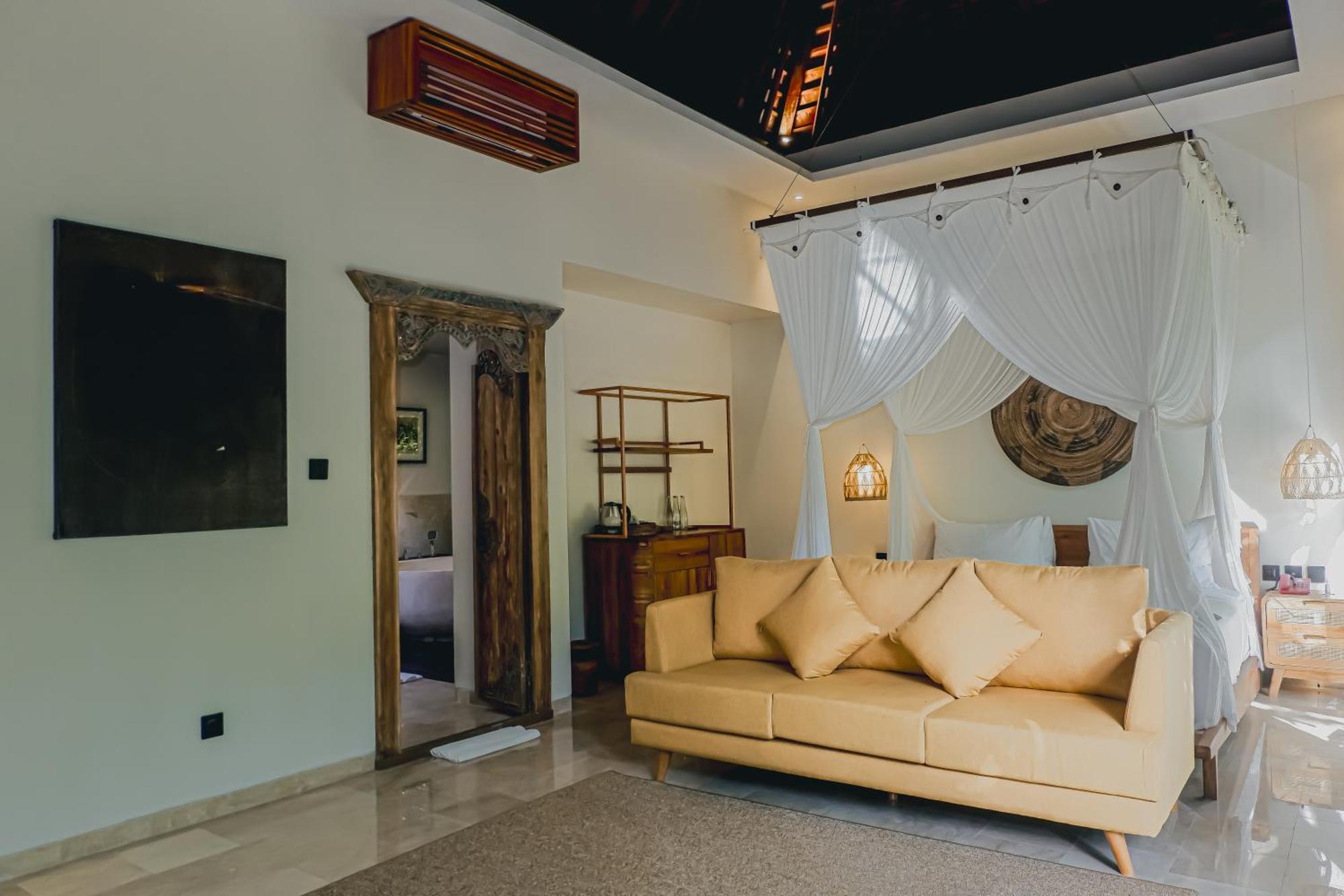 The Sebali Resort ウブド エクステリア 写真 A room at the resort