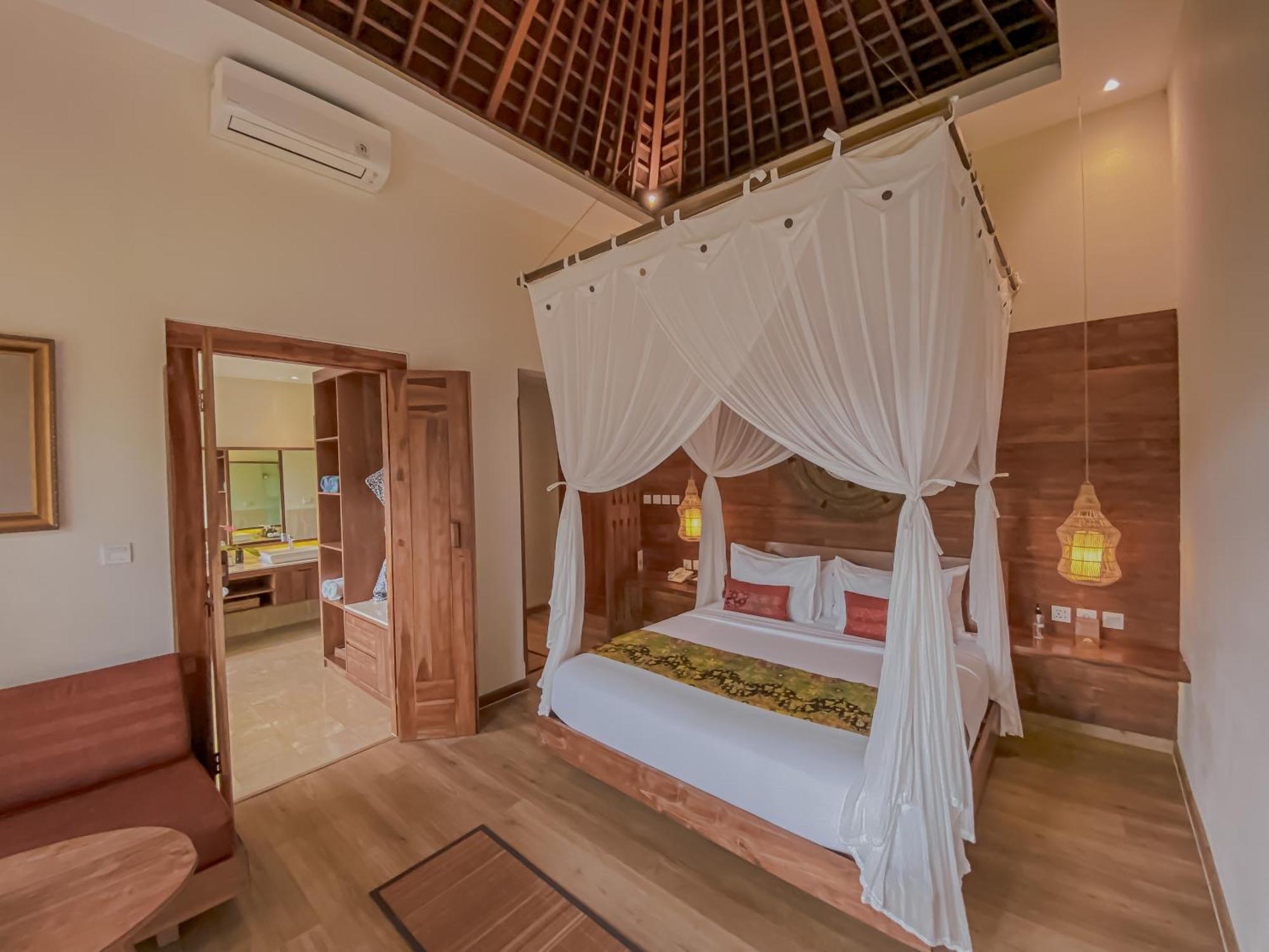 The Sebali Resort ウブド エクステリア 写真 A bedroom at the resort